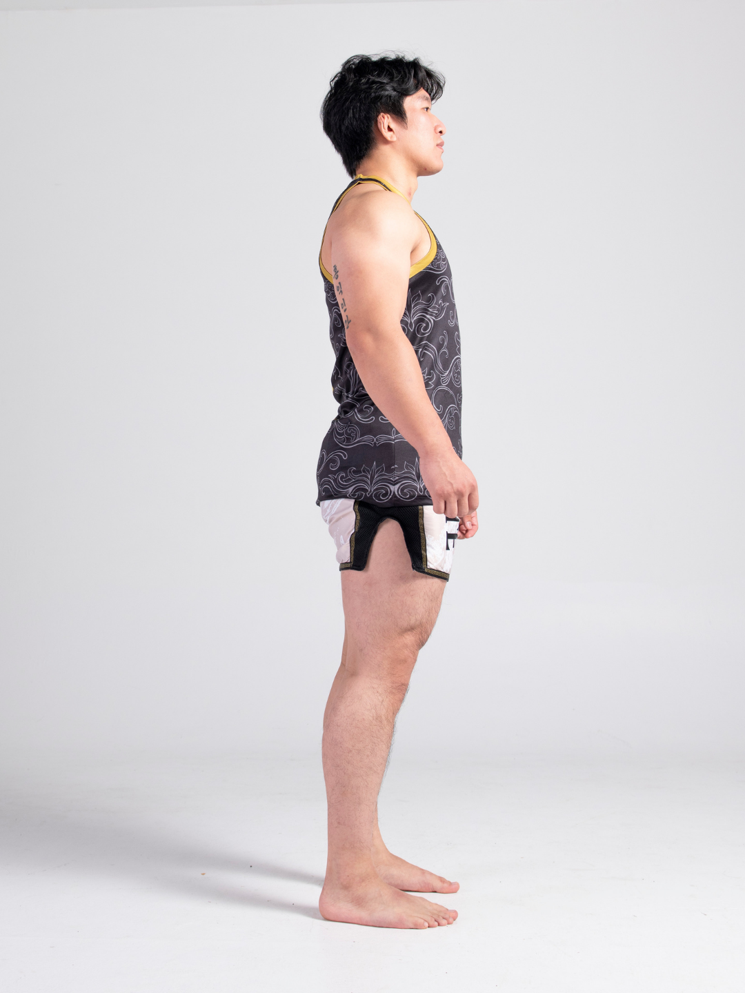 Dynasty Muay Thai Set - Black Gold jersey and Ivory beige shorts, product image by Sente Athletics