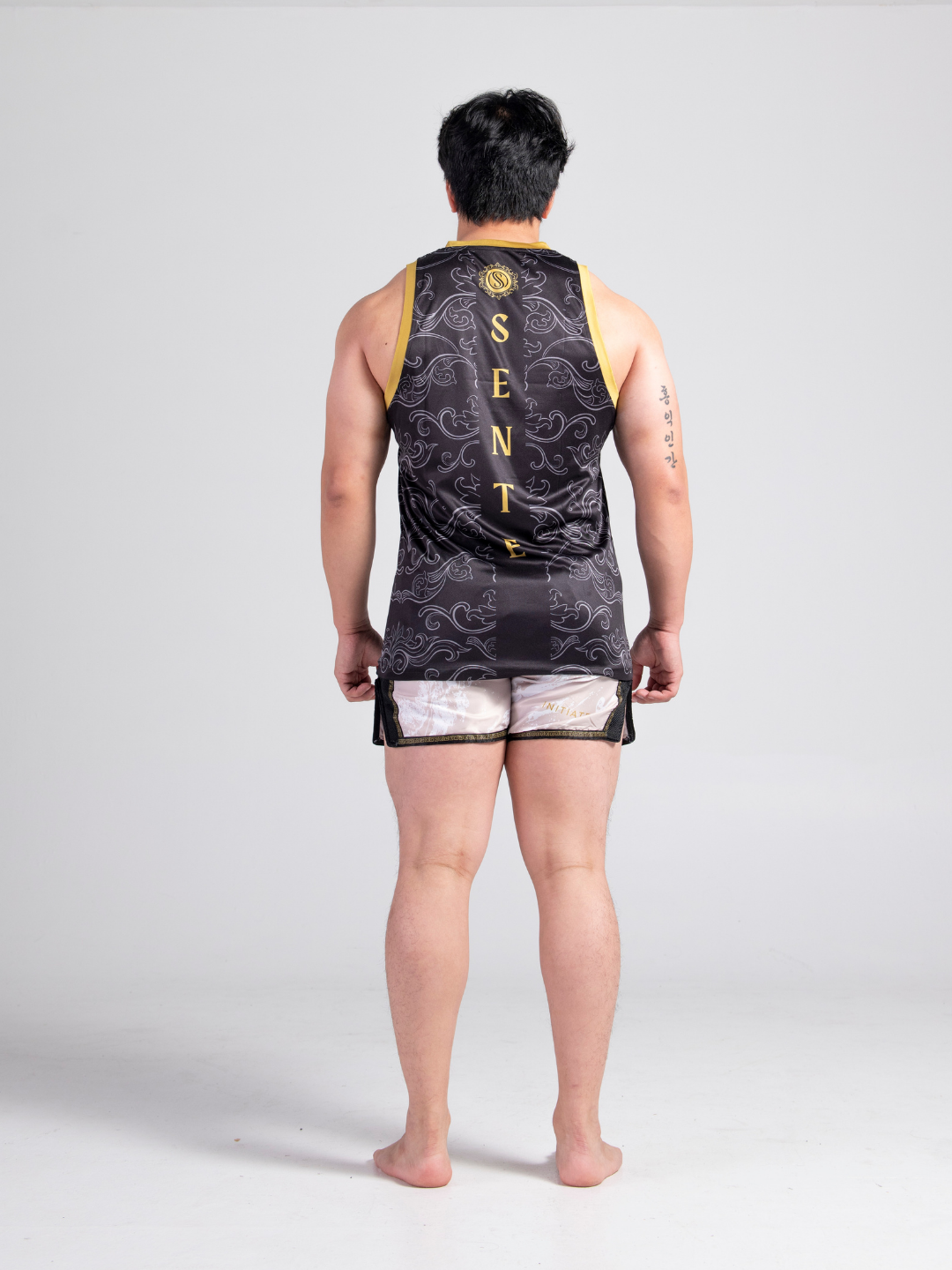 Dynasty Muay Thai Set - Black Gold jersey and Ivory beige shorts, product image by Sente Athletics