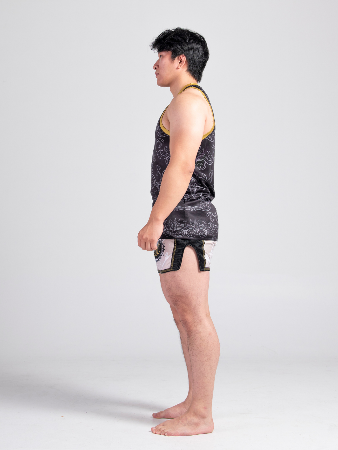 Dynasty Muay Thai Set - Black Gold jersey and Ivory beige shorts, product image by Sente Athletics